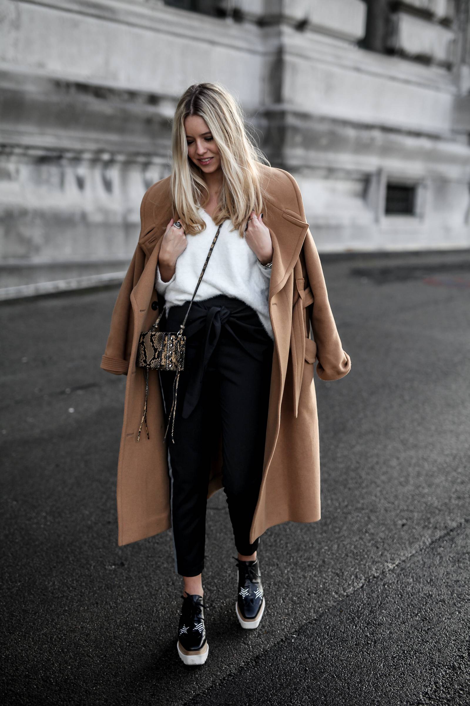 Camel coat and white knit