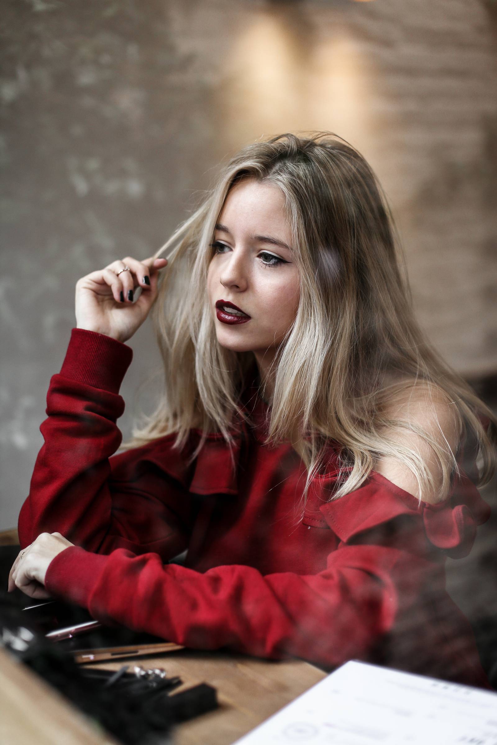 Blond girl, red sweater