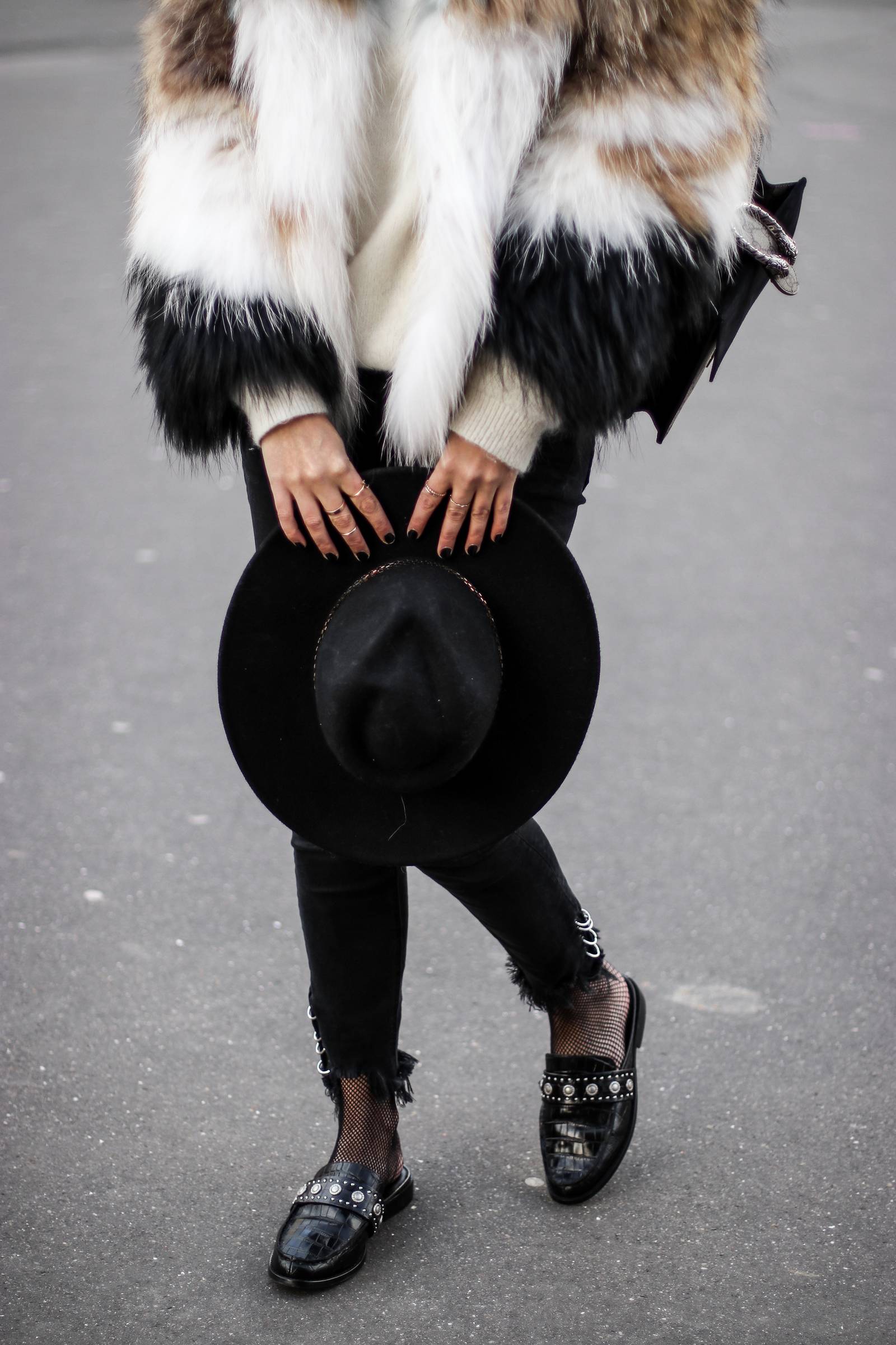black hat and open loafers