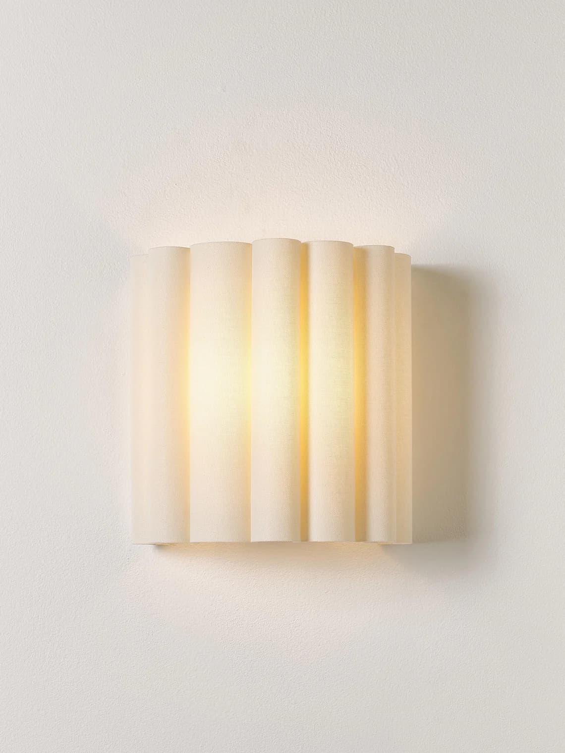 applique murale arrondie en lin blanc Westwing Collection